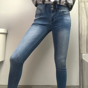 White washed blue skinny jeans